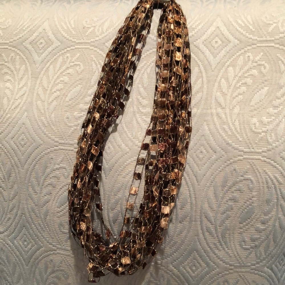 Hand made by local Illinois artist. Ribbon necklace. Approximately 12” long.
